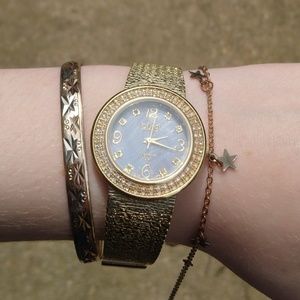 Woman's Quarts Gold Burgi Watch Real Diamonds